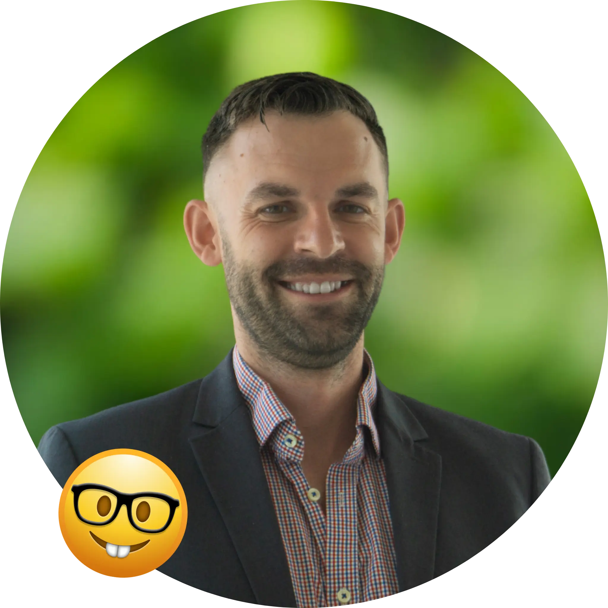 Circle cutout of Glen, with a background of green leaves