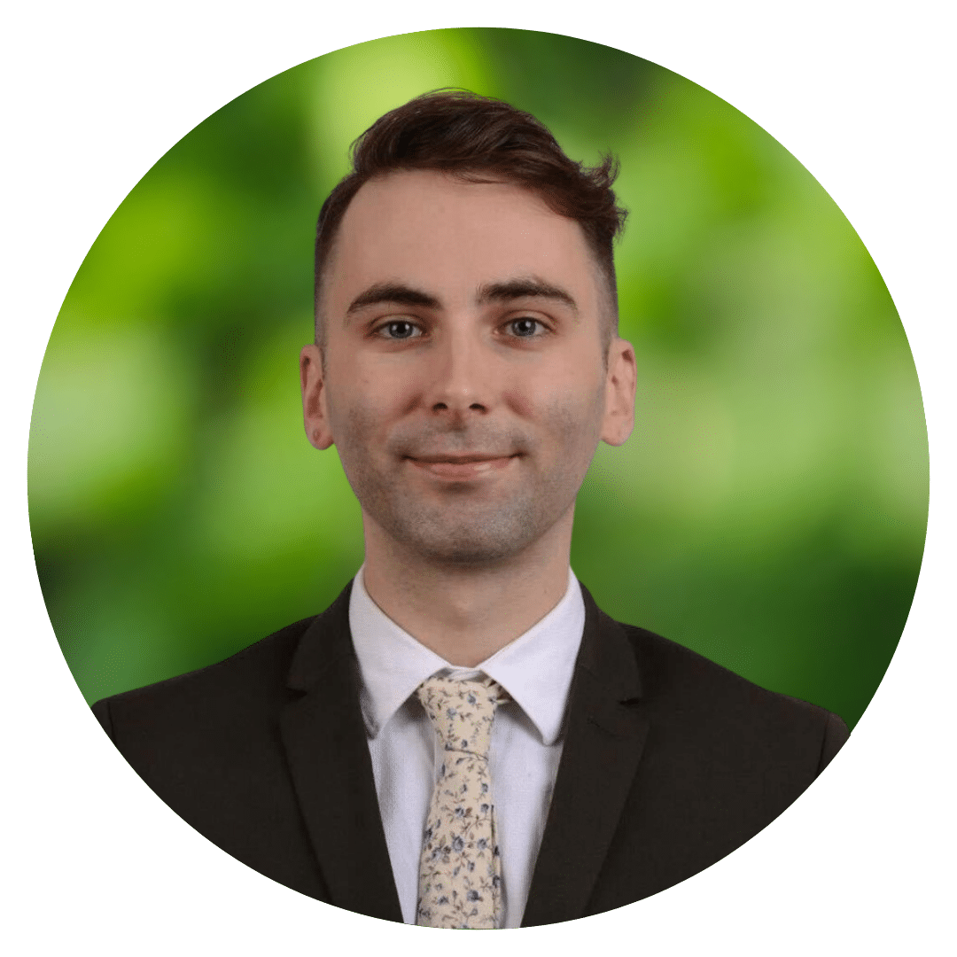 Circle cutout of Chris H's professional headshot, with a background of leaves