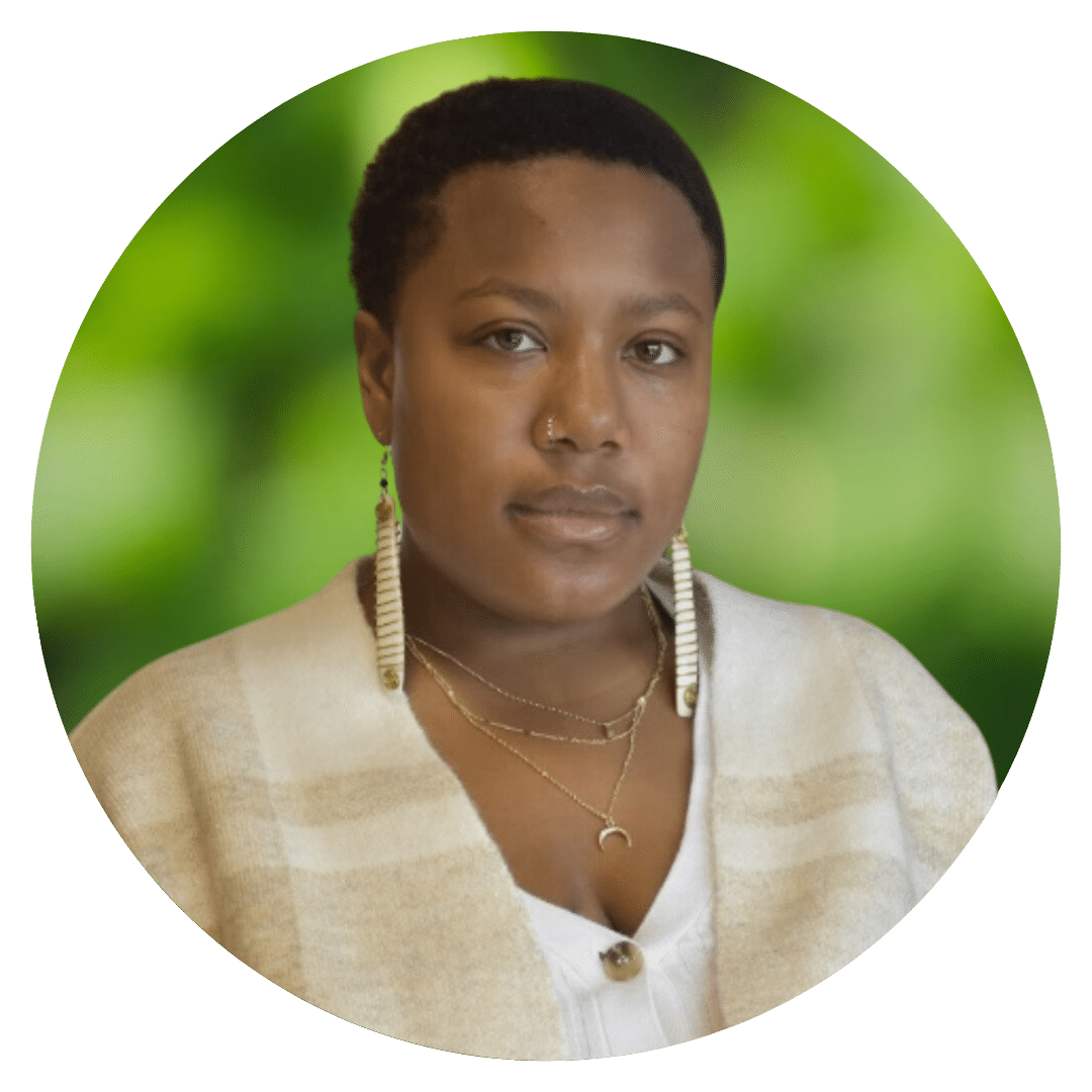 Circle cutout of D M.'s professional headshot, with a background of leaves