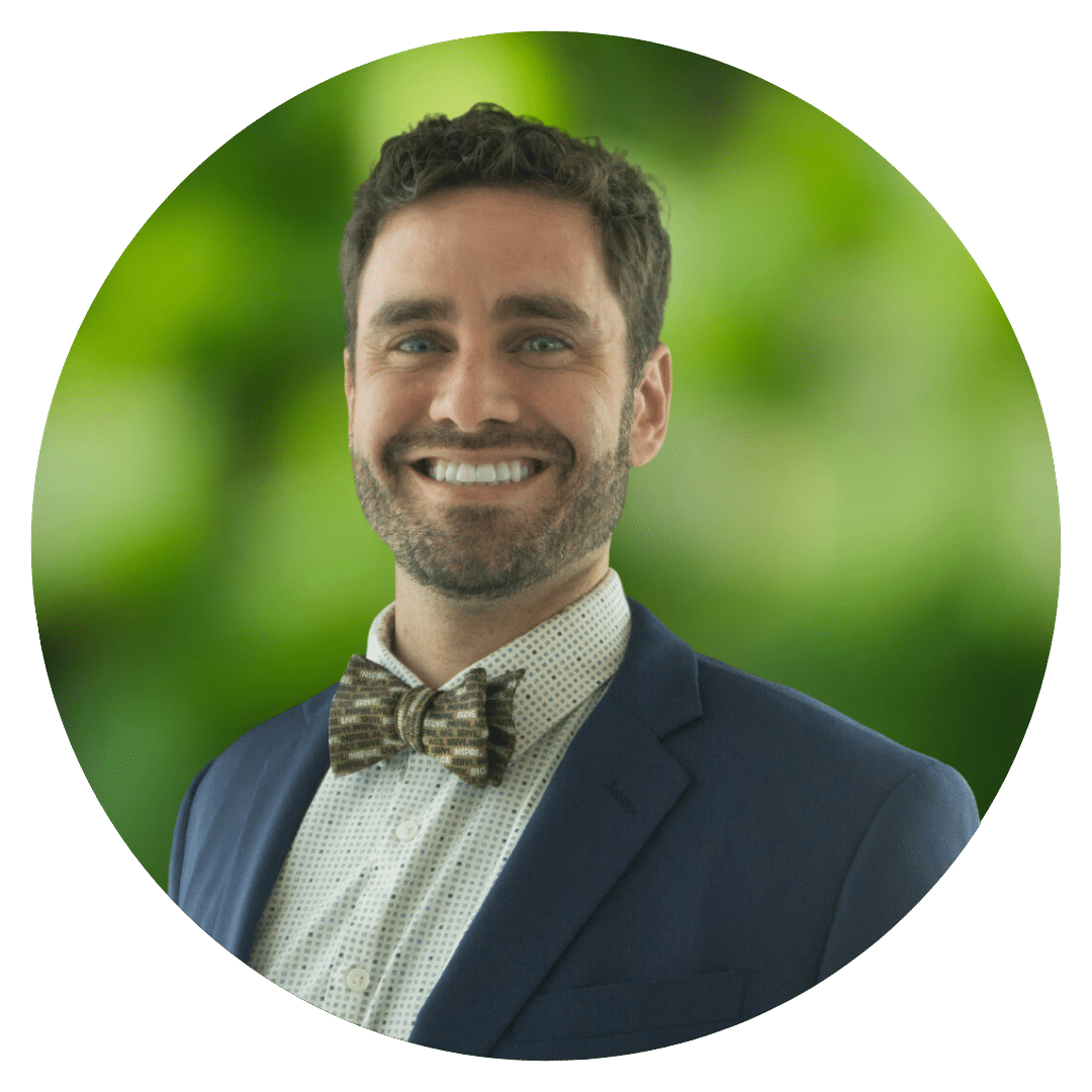 Circle cutout of James C.'s professional headshot, with a background of leaves