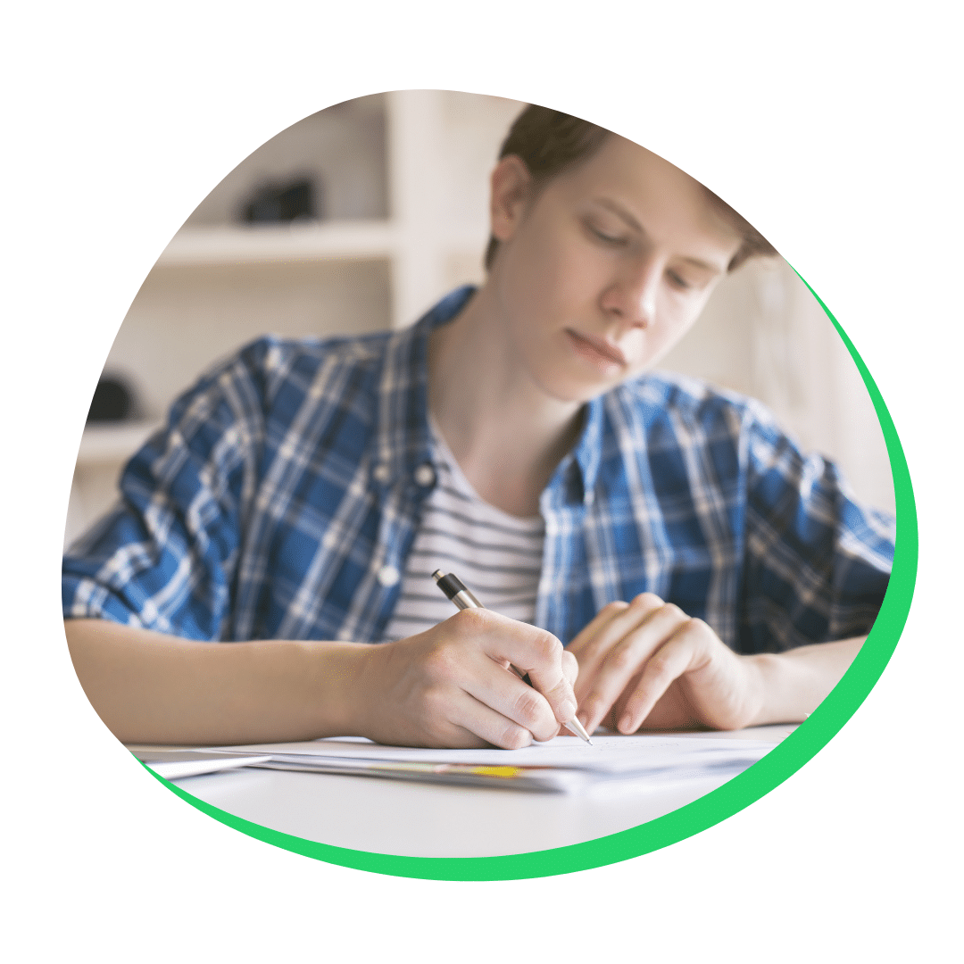 student writing UC personal insight questions