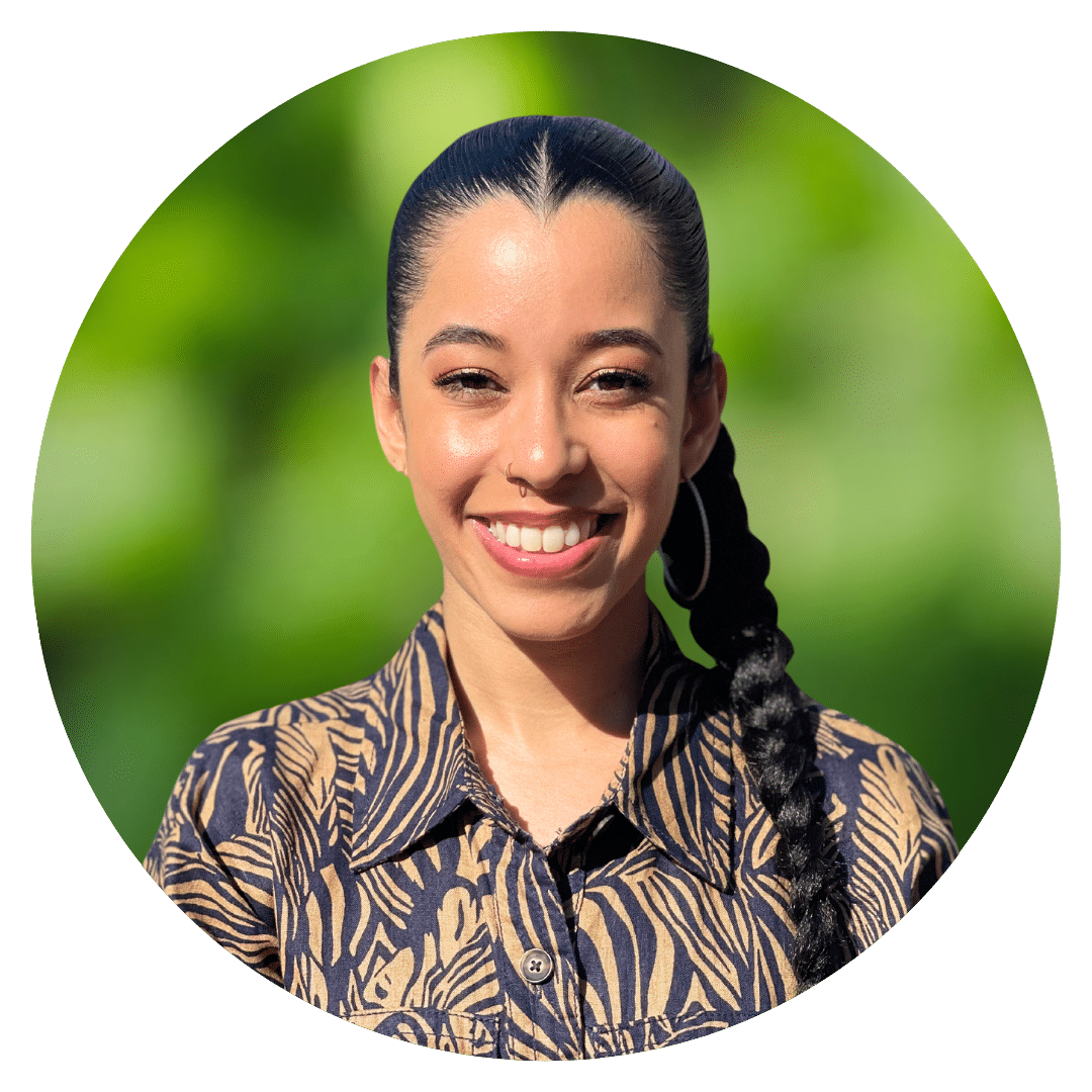 Circle cutout of Krystal D.'s professional headshot, with a background of leaves