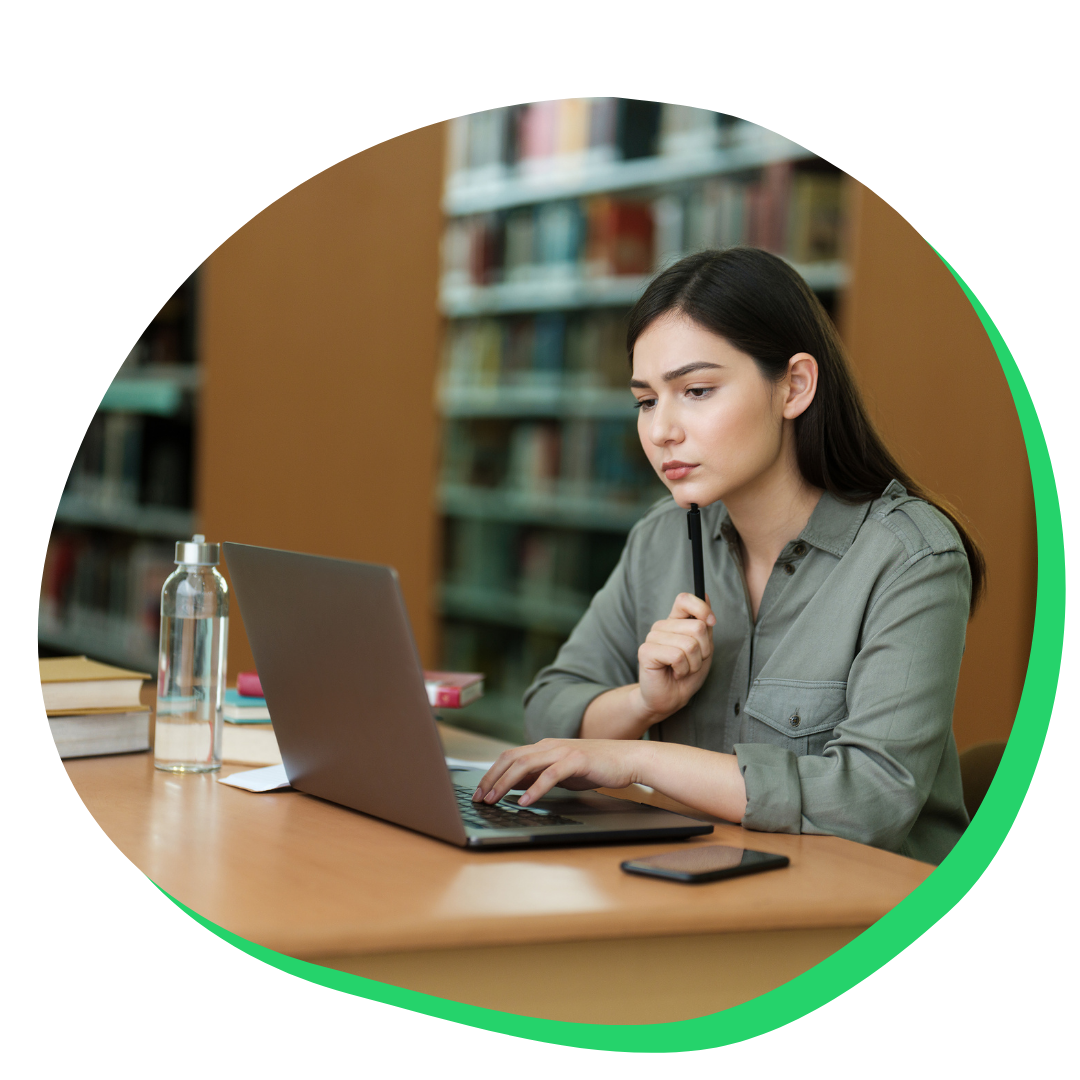 Student confirming her college decision on her computer