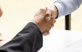 Shaking hands to accept dream job