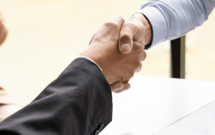 Shaking hands to accept dream job