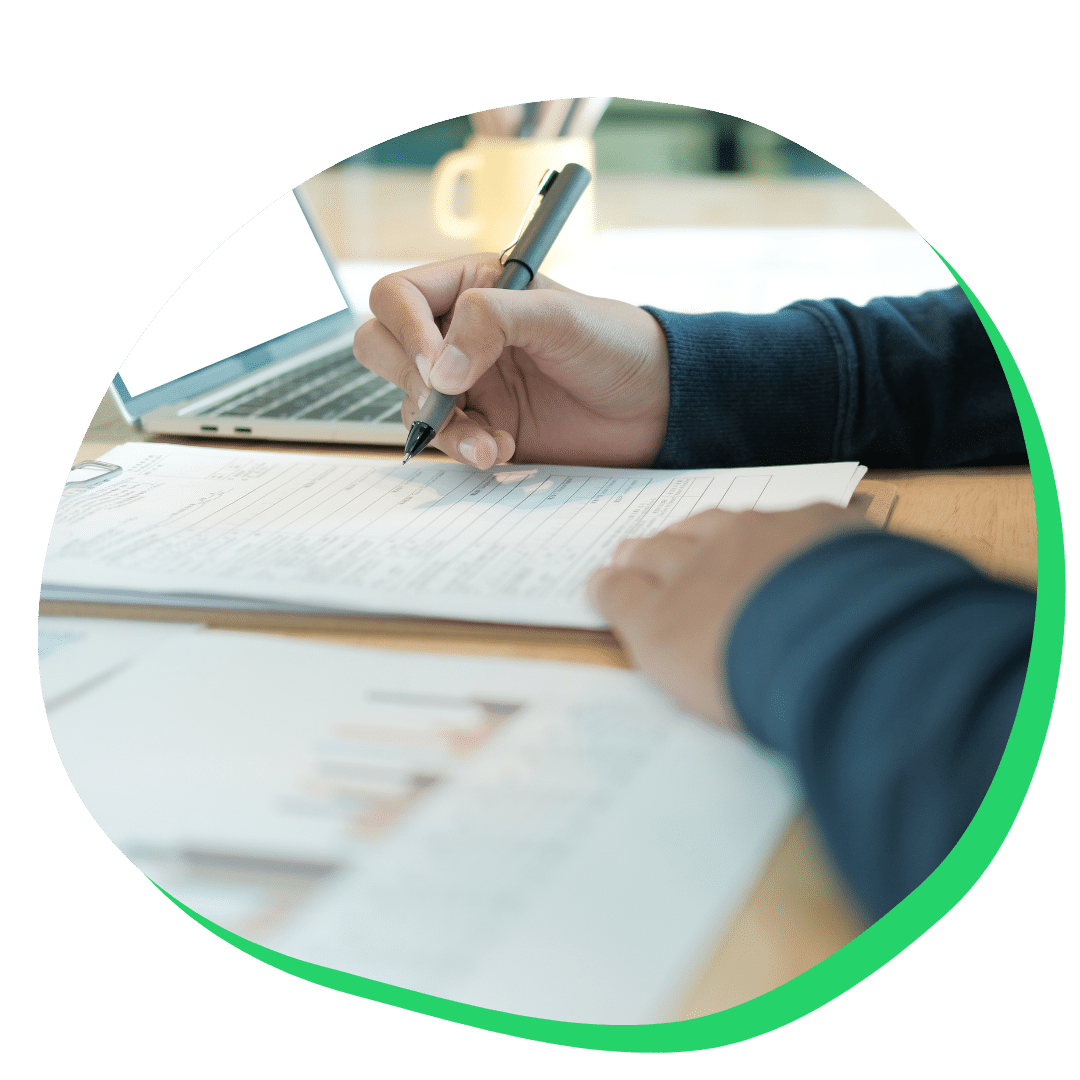 Student writing on paper