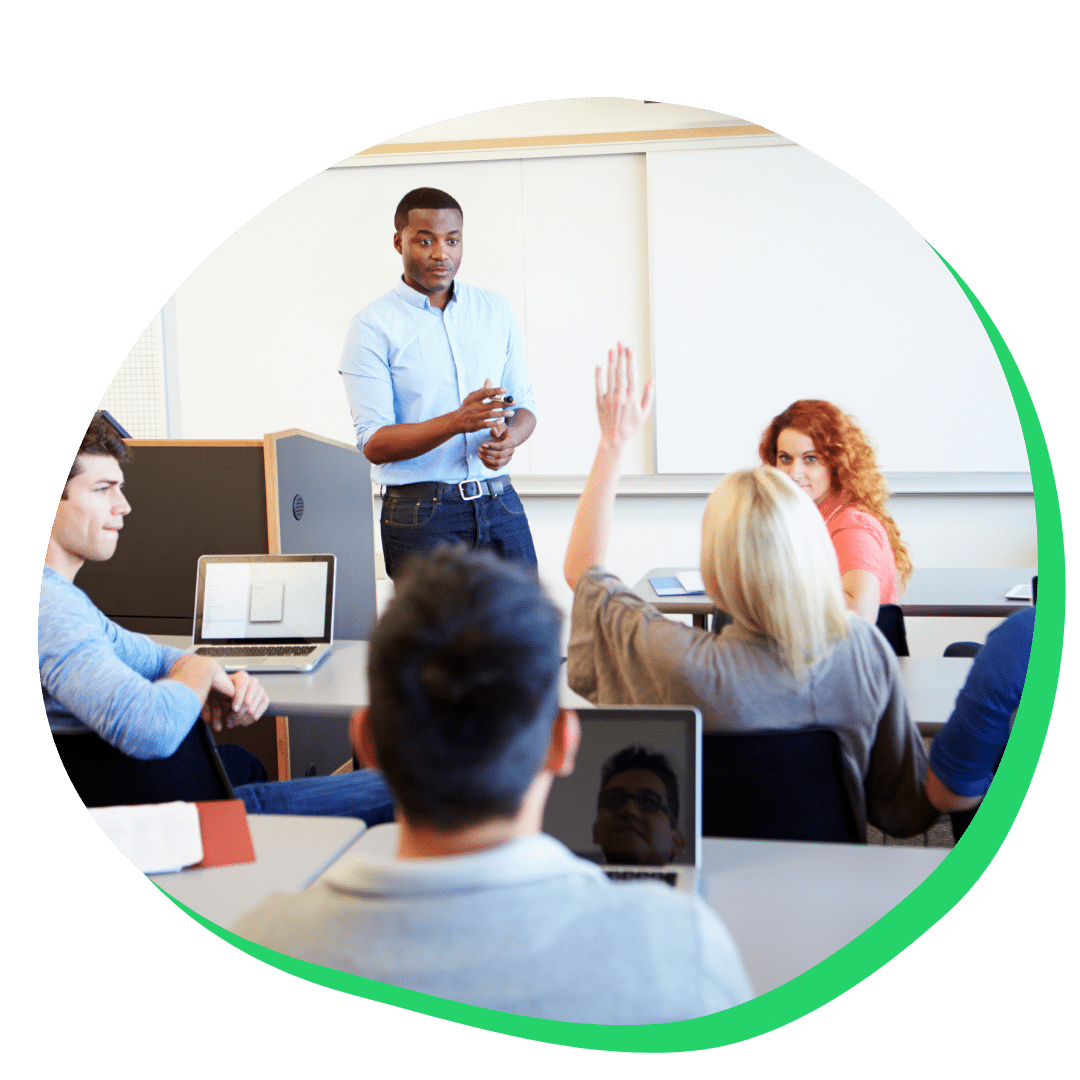 Students interacting with faculty in class