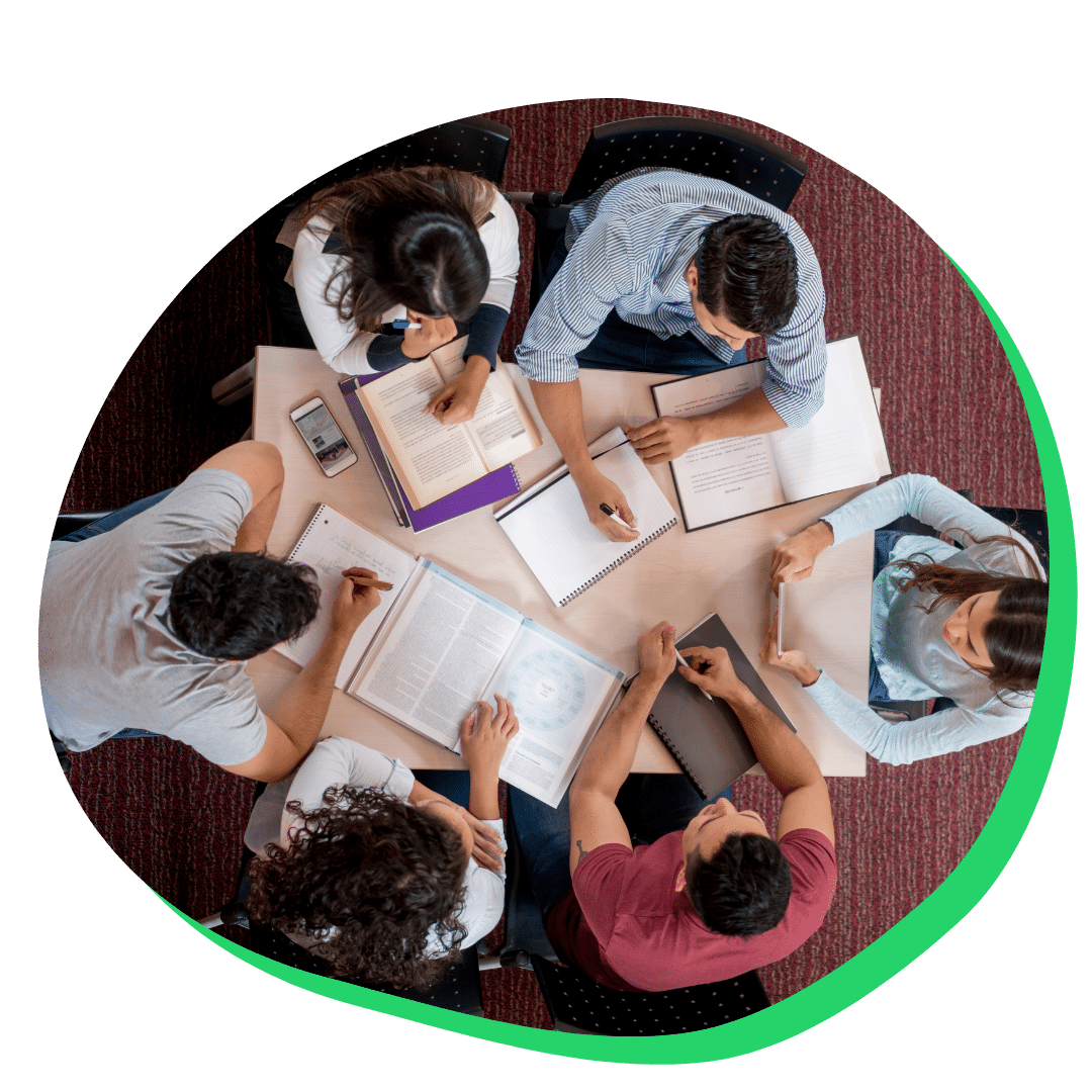 Students working in a group at a table together