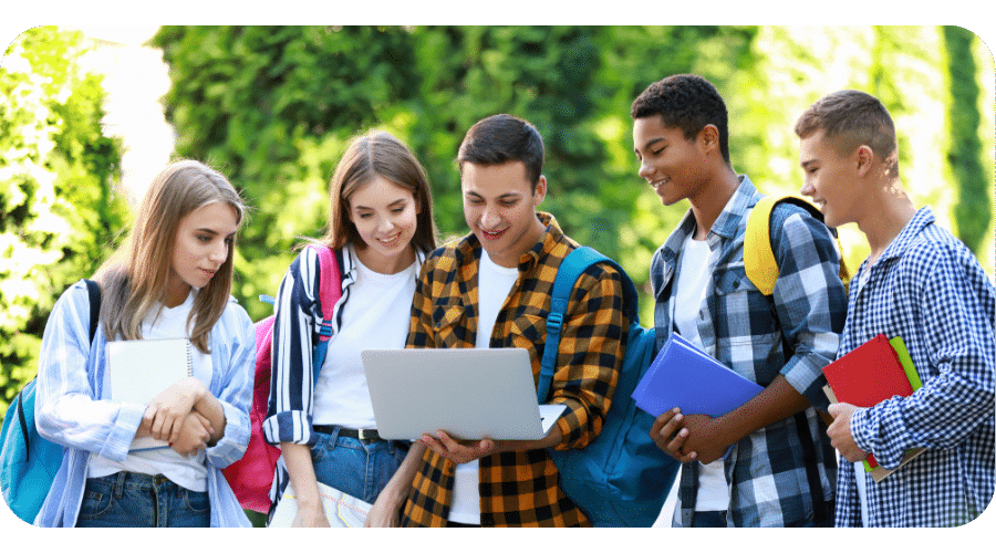 students looking at college applications