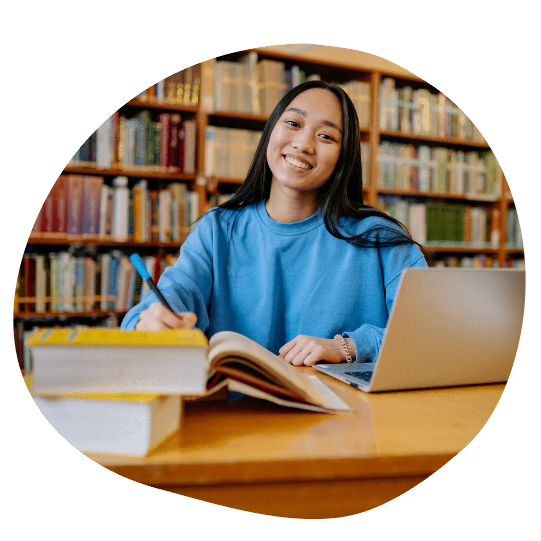 12th grade student studying in the library