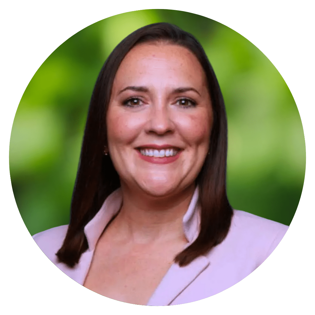 Circle cutout of Katherine B.'s professional headshot, with a background of leaves