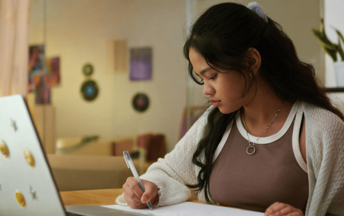 Common App essay prompts being reviewed by a student.